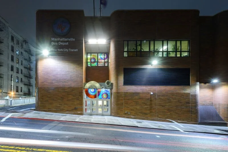 “The Wheels on the Bus” (2018) © Tomo Mori, NYCT Manhattanville Bus Depot. Commissioned by Metropolitan Transportation Authority Arts &amp; Design. Photo: Filip Wolak. Laminated glass fabricated by Glasmelarei Peters Studio and metal sculpture by Art Metal Industries.
