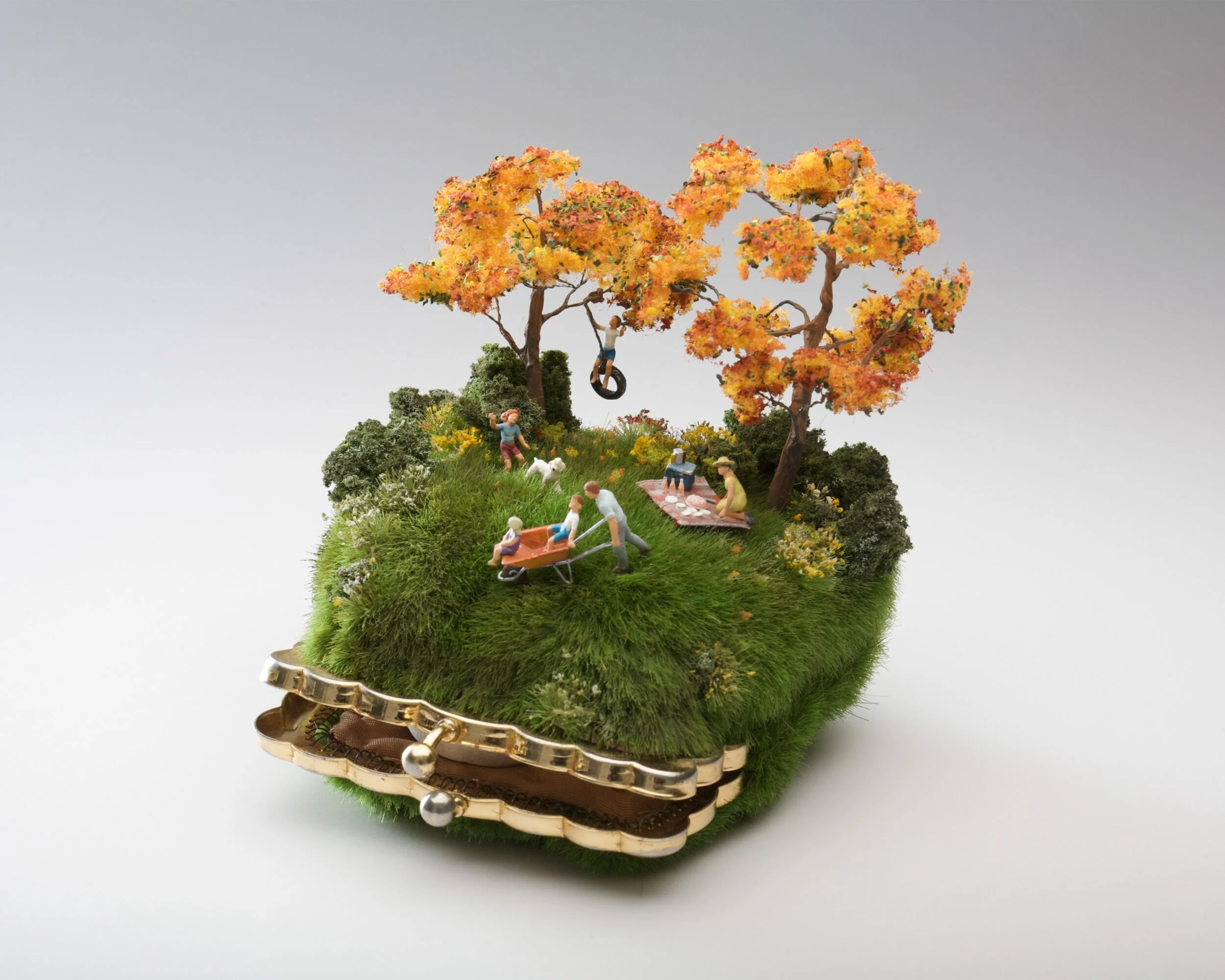 “Backyard Chase, Race, Apace,” mixed media assemblage, 11cm x 11cm x 12cm