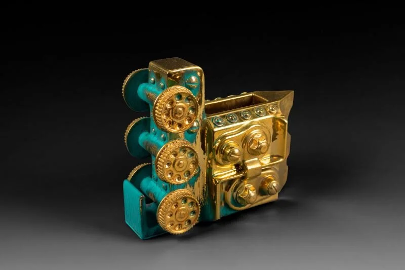 “Euclidean Cup, Forge, Six Gears,” 2021, Gold Luster Glaze, Oil Painted Earthenware - 6 x 7 x 3in. (15.2 x 17.8 x 7.6cm)