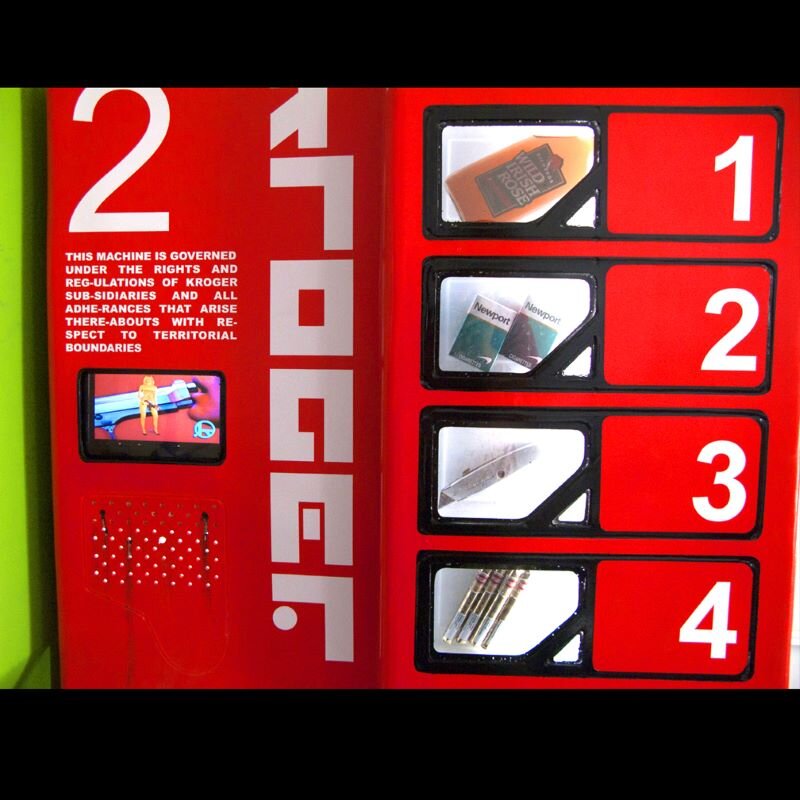 “Assault Weapon Vending Machines” from the series Supply And Demand