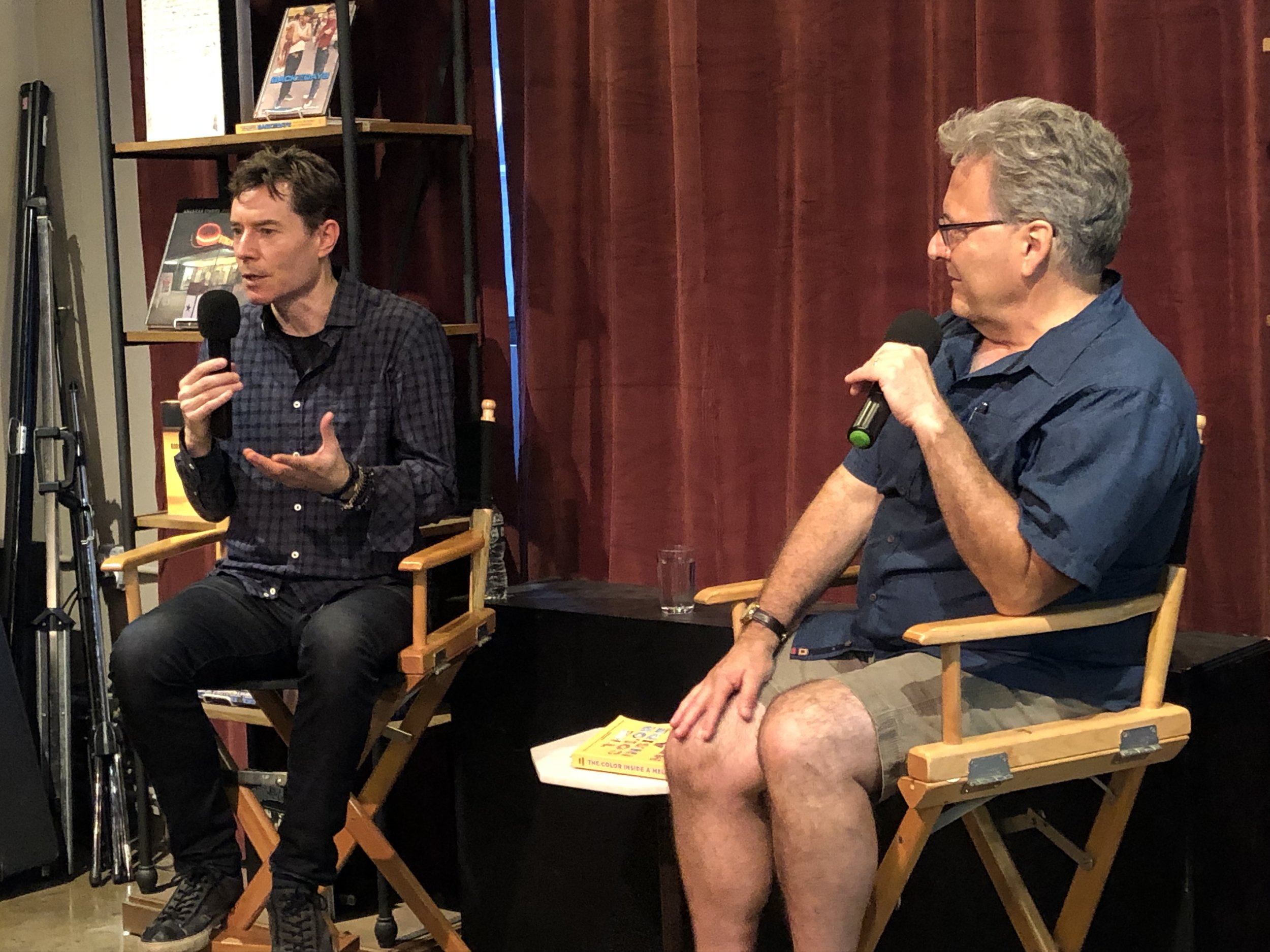 Christopher talks with author John Domini at the Powerhouse Arena bookstore, Brooklyn, July 2019